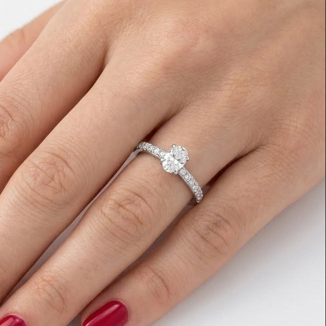 0.45 Ct. Natural Oval Diamond Ring with Side Stones