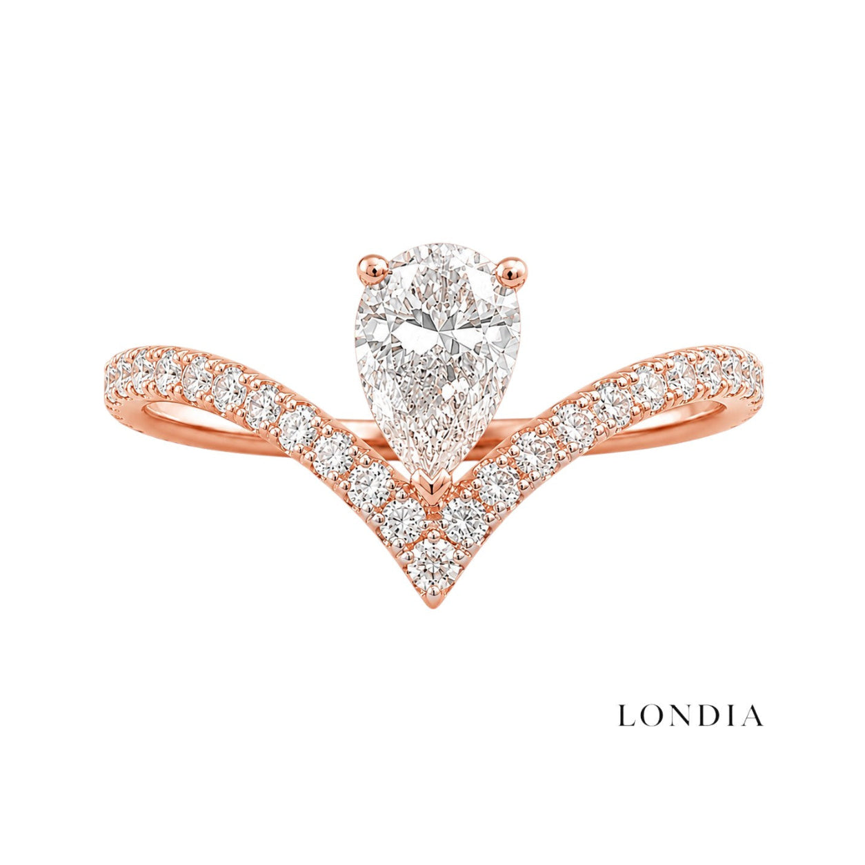 0.55 Carat Diamond Pear-Shaped Design Ring with Side Stones in 14K Gold
