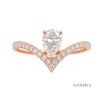 0.55 Carat Diamond Pear-Shaped Design Ring with Side Stones in 14K Gold