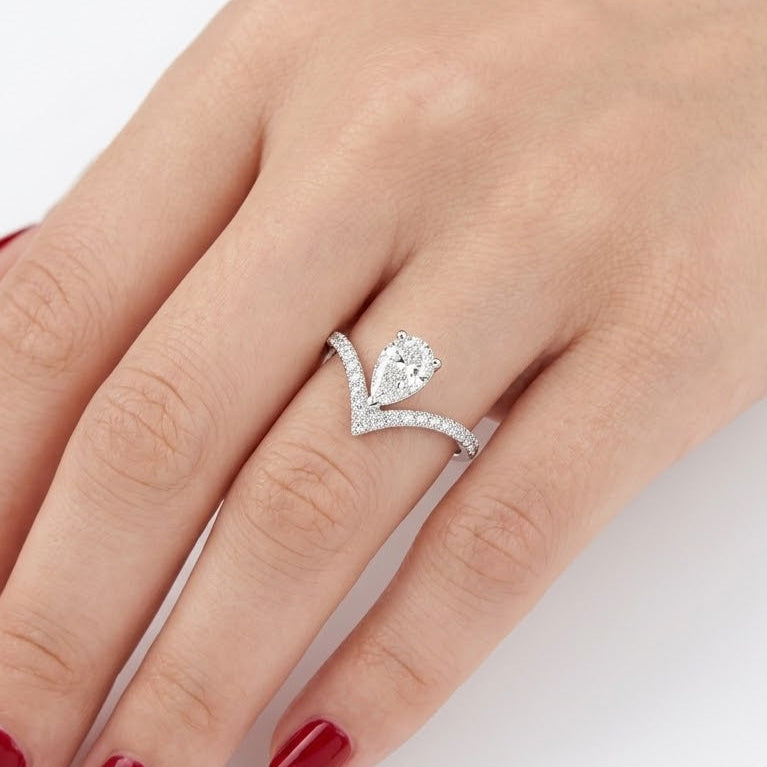 0.55 Carat Diamond Pear-Shaped Design Ring with Side Stones in 14K Gold