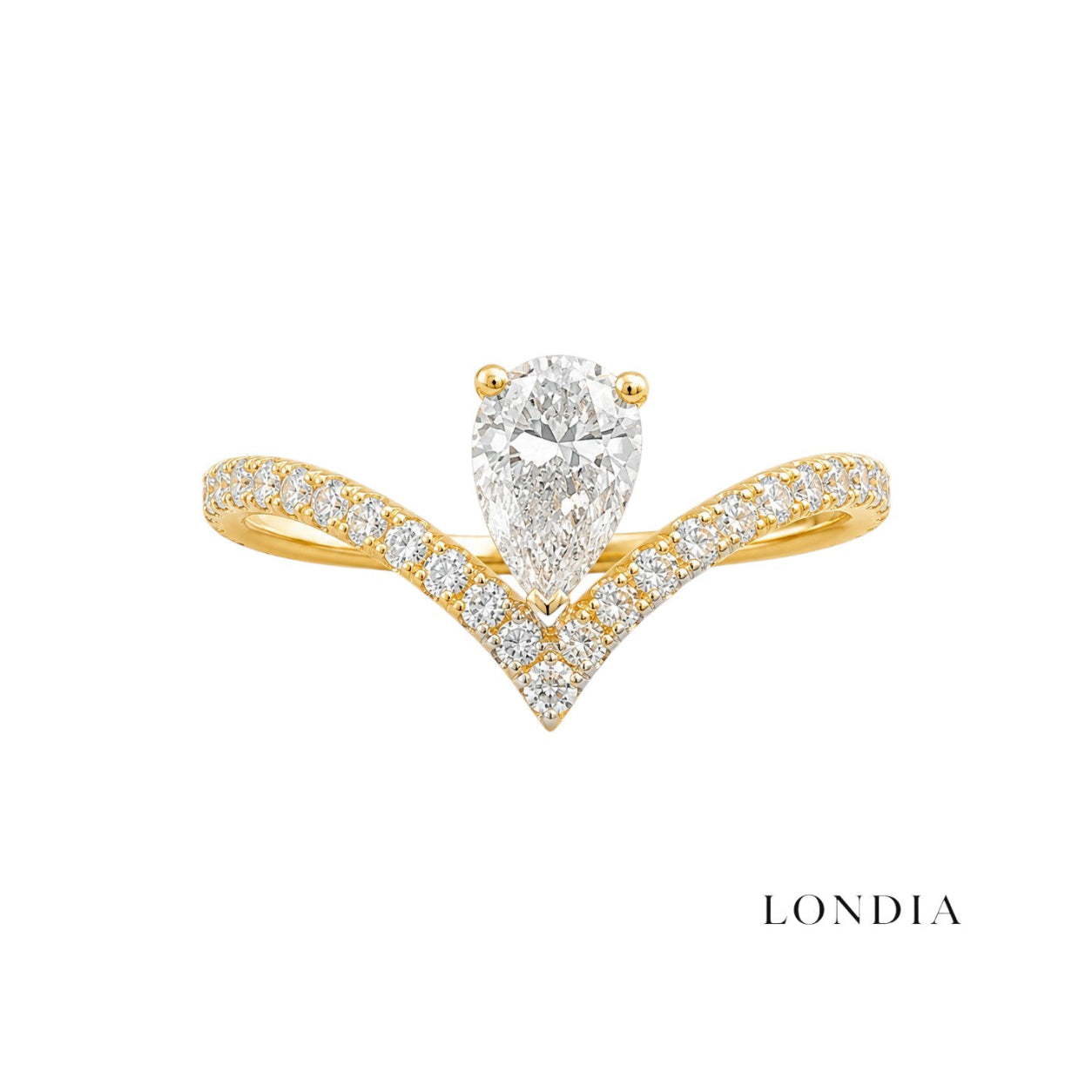 0.55 Carat Diamond Pear-Shaped Design Ring with Side Stones in 14K Gold