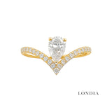0.55 Carat Diamond Pear-Shaped Design Ring with Side Stones in 14K Gold