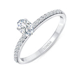 0.55 Ct. Natural Oval Diamond Solitaire Ring with Side Stones