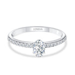0.55 Ct. Natural Oval Diamond Solitaire Ring with Side Stones