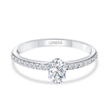 0.55 Ct. Natural Oval Diamond Solitaire Ring with Side Stones