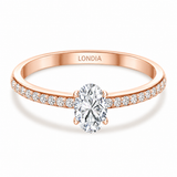0.55 Ct. Natural Oval Diamond Solitaire Ring with Side Stones