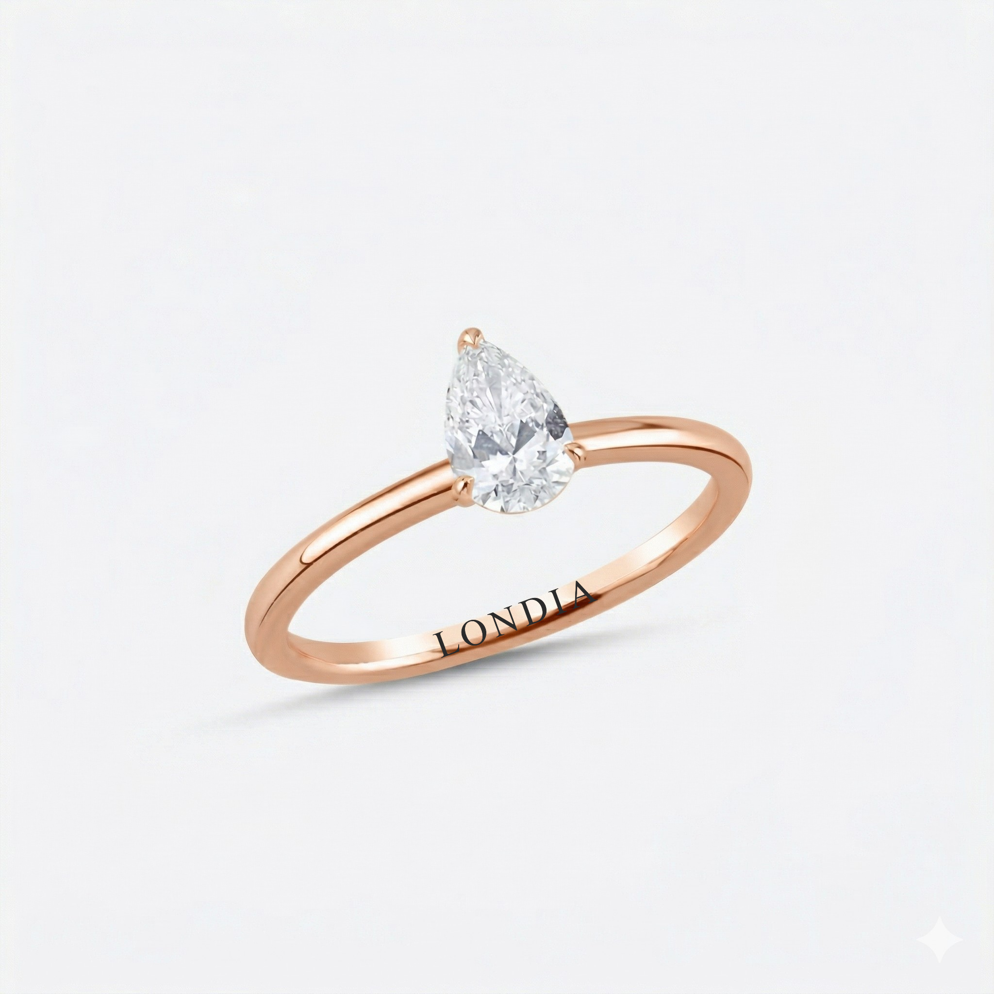 0.60 Carat Pear Cut Solitaire Diamond Ring