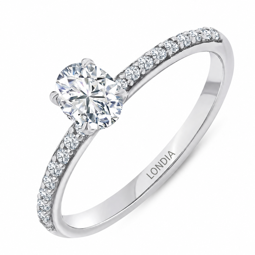 0.65 Ct. Natural Oval Diamond Solitaire Ring with Side Stones