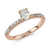0.70 Ct Natural Oval Diamond Solitaire Ring with Side Stones – 18K Gold