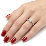 0.70 Ct Natural Oval Diamond Solitaire Ring with Side Stones – 18K Gold