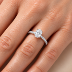 0.70 Carat F Color HRD Certified Oval Diamond Ring with Side Stones