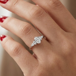 0.80 Ct. Natural Oval Diamond Ring with Marquise & Pear Side Diamonds