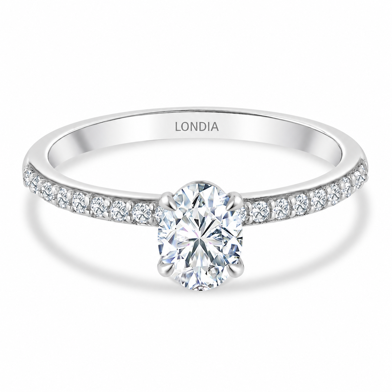 0.85 Ct. Natural Oval Diamond Solitaire Ring with Side Stones