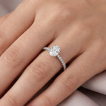 0.85 Ct. Natural Oval Diamond Solitaire Ring with Side Stones