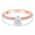 0.85 Ct. Natural Oval Diamond Solitaire Ring with Side Stones
