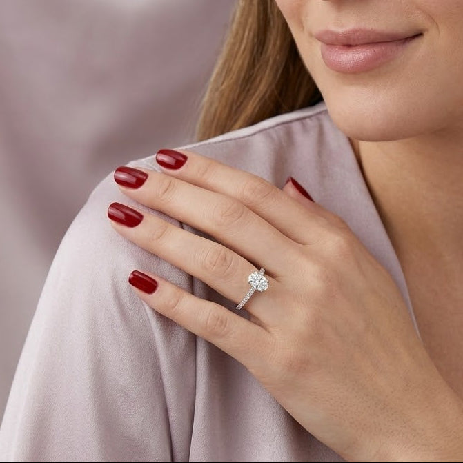 0.85 Ct. Natural Oval Diamond Solitaire Ring with Side Stones