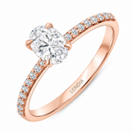 0.85 Ct. Natural Oval Diamond Solitaire Ring with Side Stones