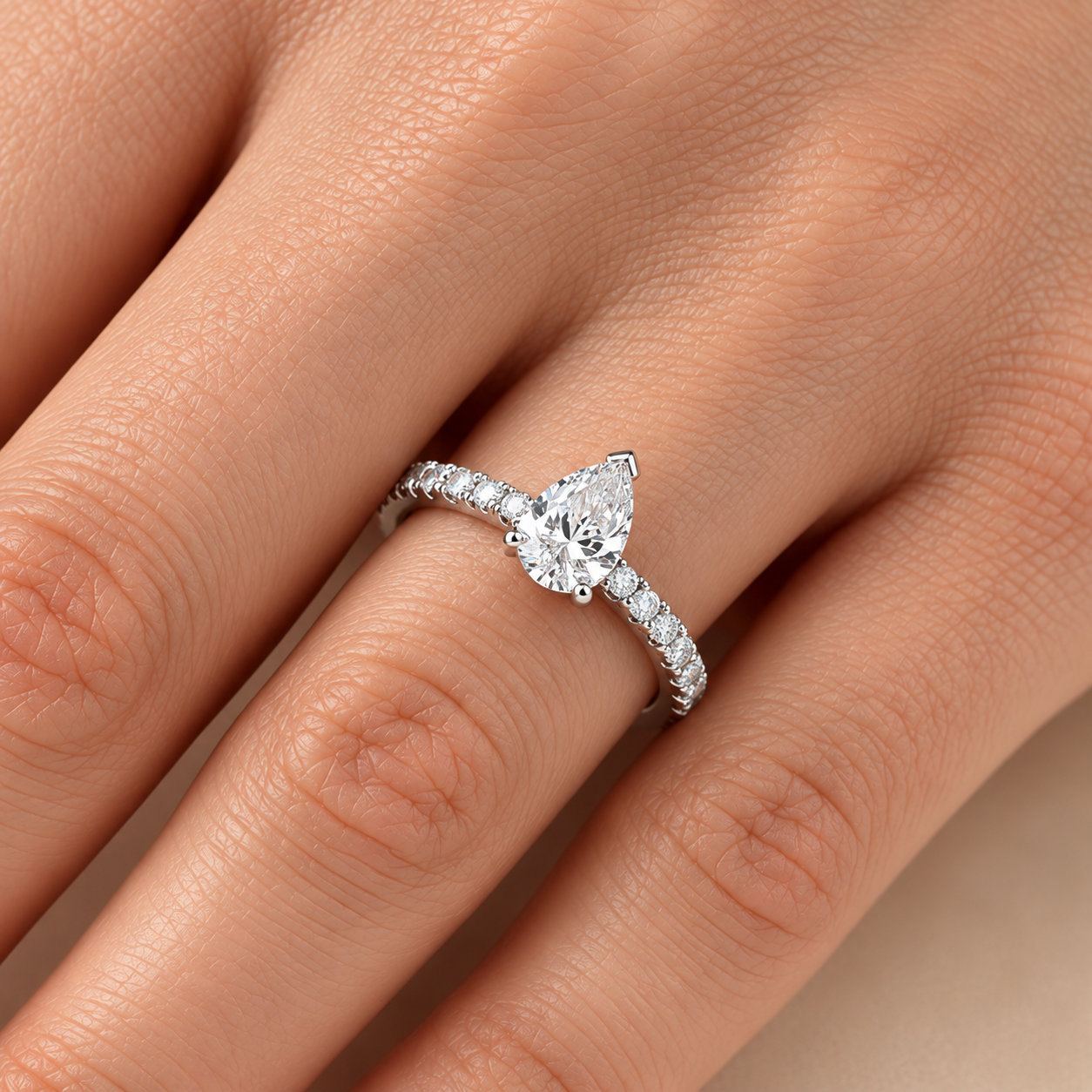 0.90 Ct. F Color HRD Certified Pear Cut Diamond Ring with Side Stones