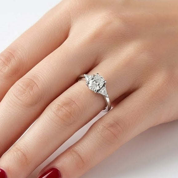 0.95 Ct. Natural Oval Diamond Solitaire Ring with Side Stones