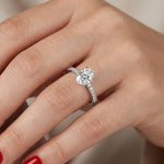 0.95 Ct. Natural Oval Diamond Solitaire Ring with Side Stones