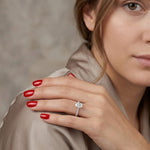 0.95 Ct. Natural Oval Diamond Solitaire Ring with Side Stones
