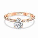 0.95 Ct. Natural Oval Diamond Solitaire Ring with Side Stones