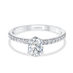 0.95 Ct. Natural Oval Diamond Solitaire Ring with Side Stones