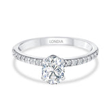 0.95 Ct. Natural Oval Diamond Solitaire Ring with Side Stones