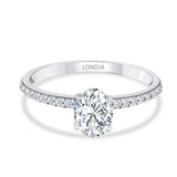 1.05 Ct. Natural Oval Diamond Side Stone Solitaire Ring