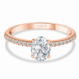 1.05 Ct. Natural Oval Diamond Side Stone Solitaire Ring