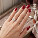 1.05 Ct. Natural Oval Diamond Side Stone Solitaire Ring