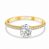 1.05 Ct. Natural Oval Diamond Side Stone Solitaire Ring