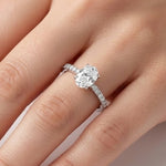 1.20 Ct. Natural Oval Diamond Side Stone Solitaire Ring