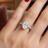 1.20 Ct. Natural Oval Diamond Side Stone Solitaire Ring