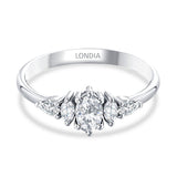 0.60 Ct. Natural Oval Diamond ''Side Stone'' Ring in 14K Gold