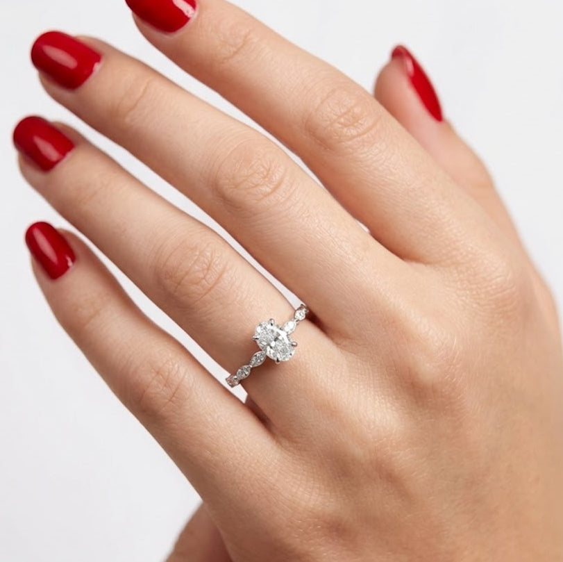 Natural Oval Diamond Side Stone Ring