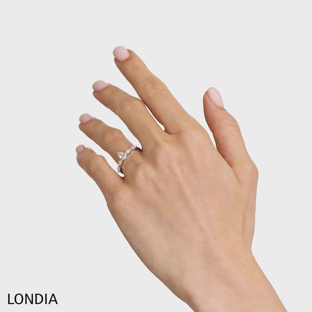 0.85 Ct. Natural Pear Diamond Solitaire ''Modern'' Ring in 14K Gold