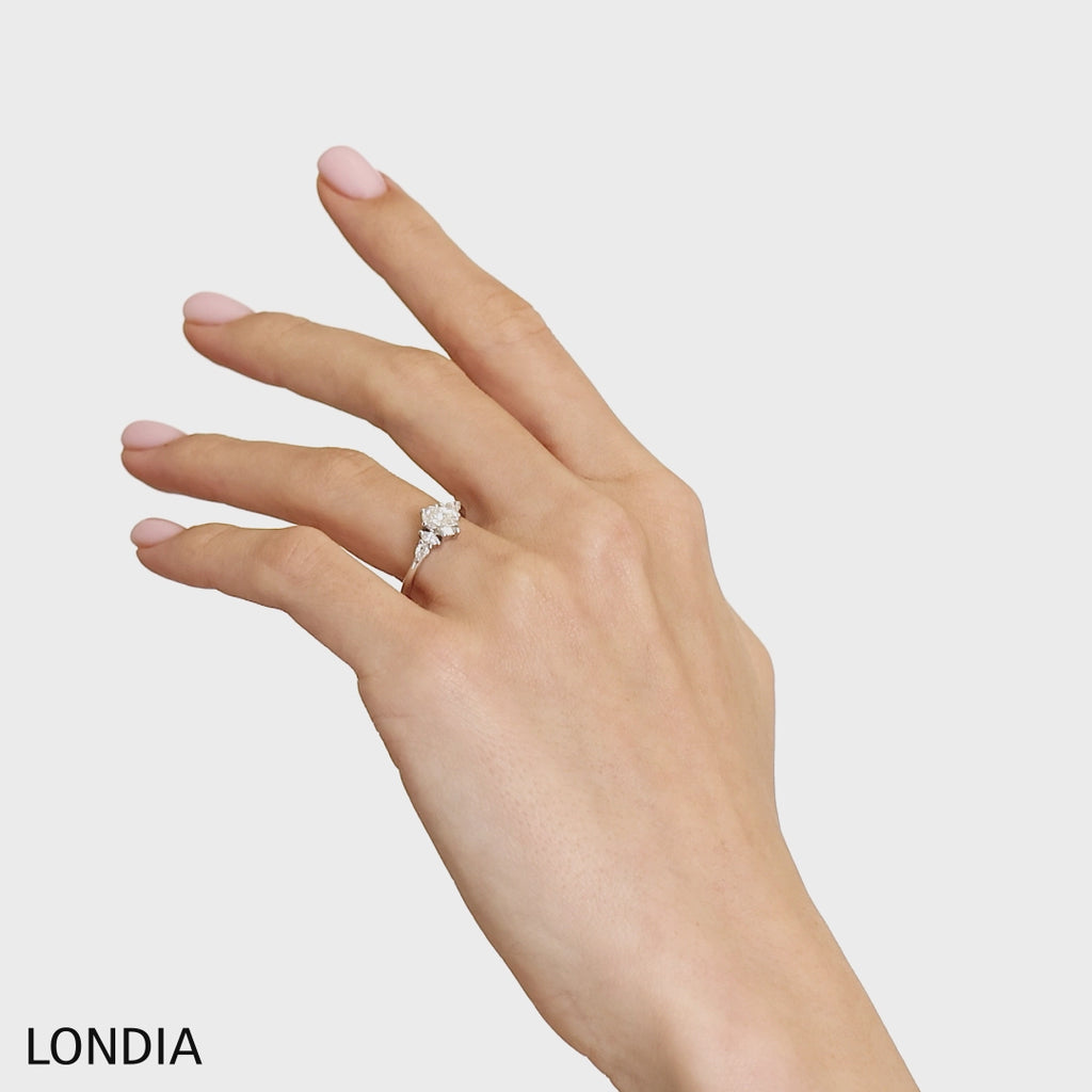 0.70 Ct. Natural Oval Diamond ''Side Stone'' Ring in 14K Gold